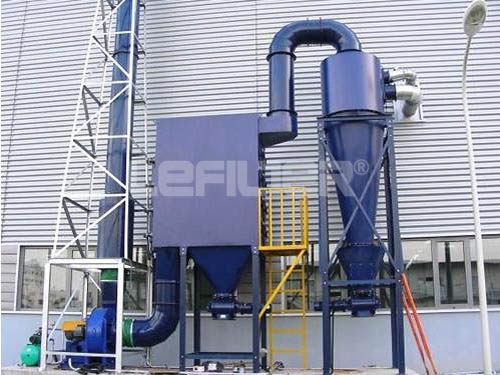 Dust collector for dry powder processing unit