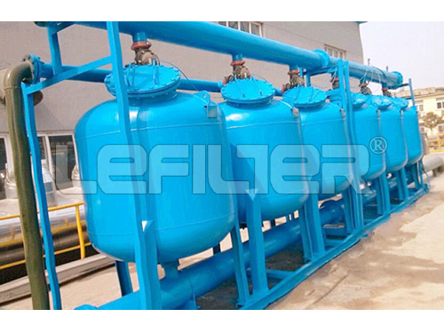 Shallow sand filter for cooling towers